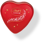 A red, heart-shaped box with LINDOR truffles (Photo)